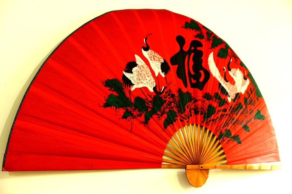 A Japanese hand-painted uchiwa fan.